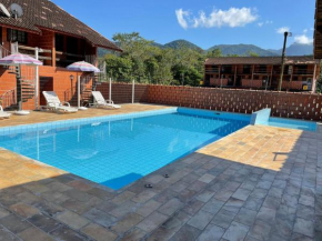 Seu Refúgio Perfeito em Ubatuba Flat Super Mobilhado com Piscina e Churrasqueira Próximo à Praia de Maranduba